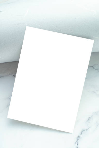 istock card mock-up on marble background 2171422035