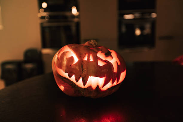 Halloween Pumpkin photography indoors, glowing illuminated face