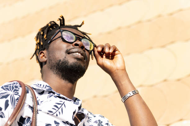 istock stylish young black man wearing sunglasses 2171429846