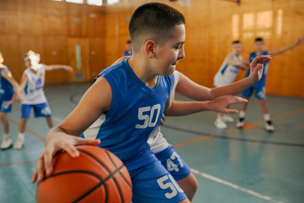 istock Youth basketball player making a move 2171430256