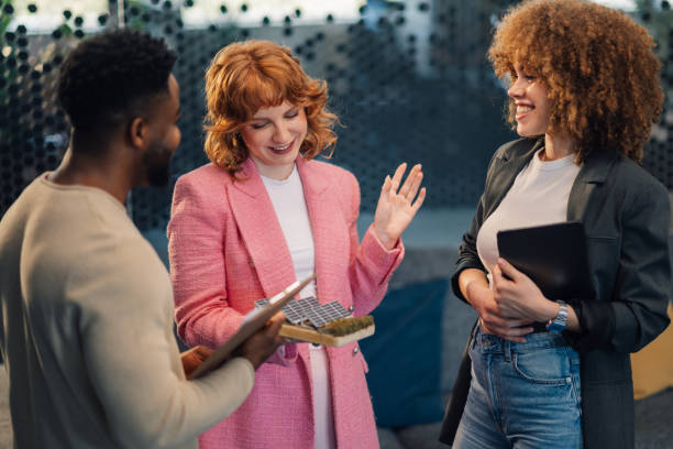 istock Diverse businesspeople at modern office collaborating on sustainability 2171430289