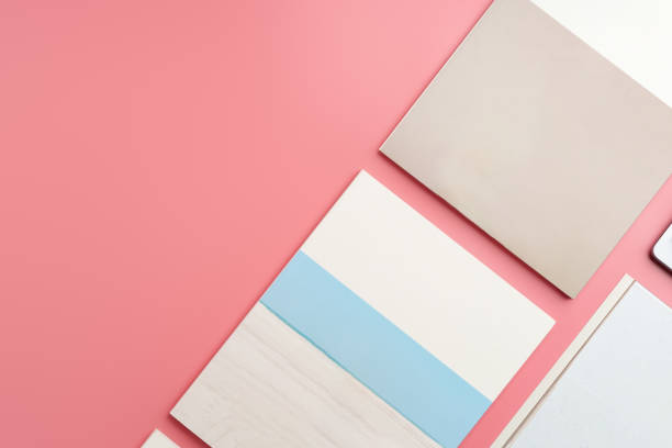 istock A Collection of Blank Papers Stacked on a Pink Surface for Creative Projects 2171448651