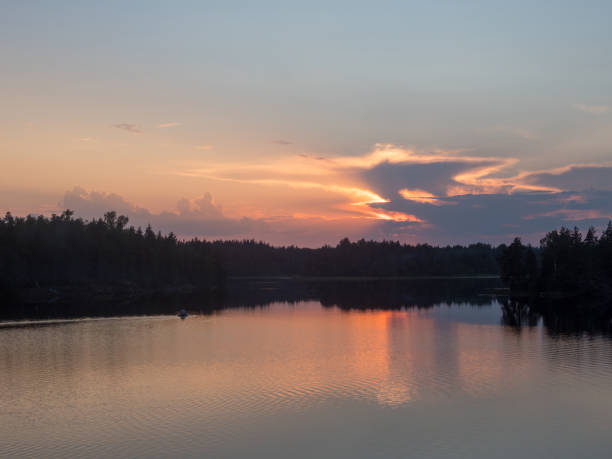 istock landscape on forest lake at sunset 2171449637