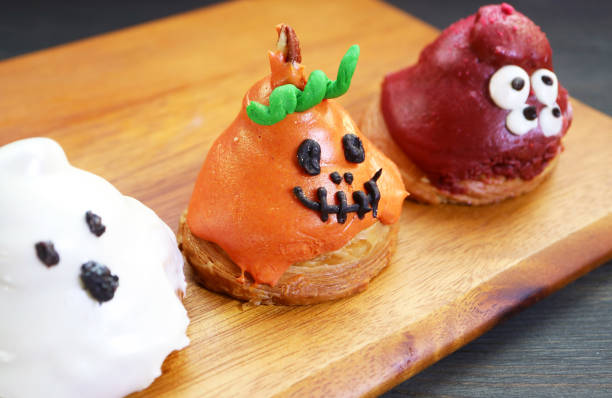 Funny Halloween Jack-O'-lantern with Monster Shaped Sugar Glazed Croissants