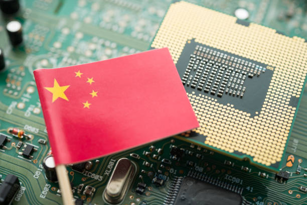 istock Chinese flag on CPU and green circuit board background. 2171450326