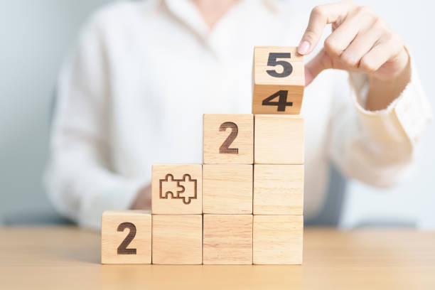 istock 2024 year change to 2025 year block with jigsaw puzzle icon. Business Process, Team, teamwork, Goal, mission, Resolution, strategy, plan, Action, partnership, and New Year start 2171454682
