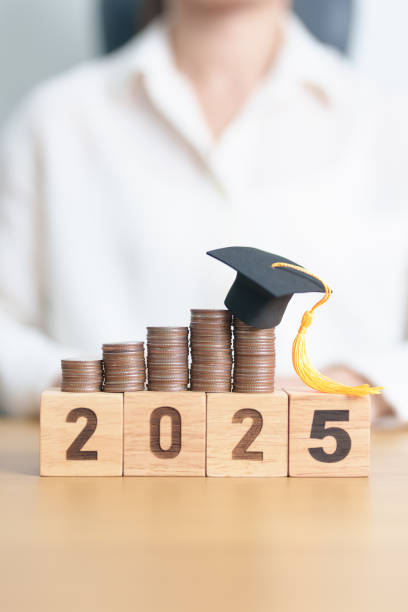 istock Happy New Year 2025 with Coins stack growing up and graduation hat. Money saving for Education, Scholarship, Student loan and debt and study future plan concept 2171454804