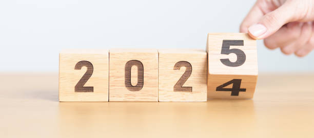 istock 2024 change to 2025 year block on table. goal, Resolution, strategy, plan, start, budget, mission, action, motivation and New Year concepts 2171454852