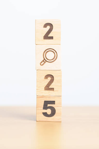 istock 2025 block with magnifying glass icon. SEO, Search Engine Optimization, hiring , Advertising, Idea, Strategy, marketing, Keyword, Content and New Year start concepts 2171455383