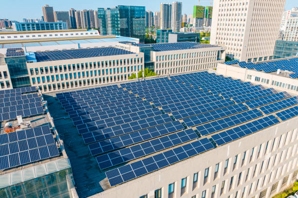 istock Solar Panels on modern city roof 2171455642