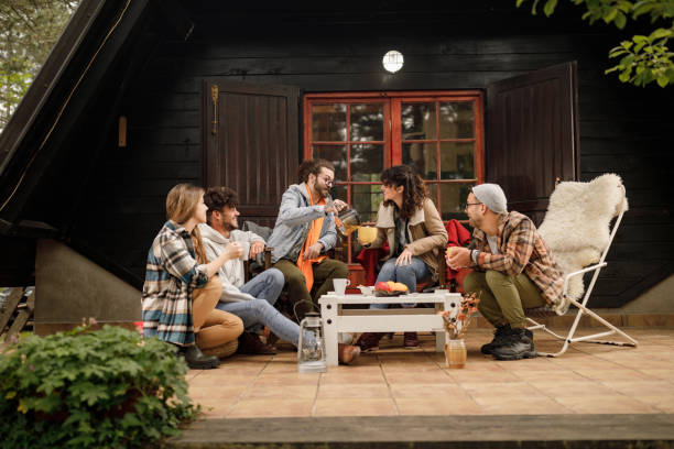 istock Happy friends enjoying in conversation on a patio. 2171455731