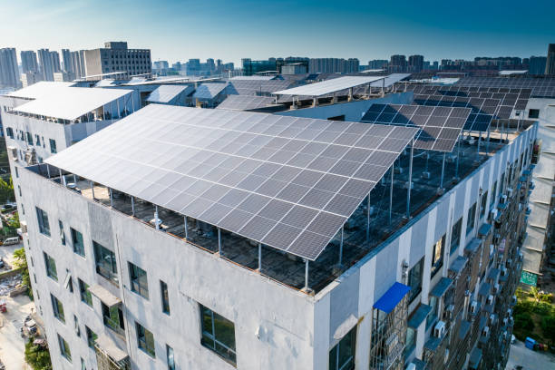 istock Solar Panels on modern city roof 2171455799