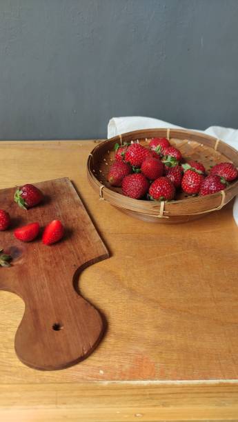 istock Fresh red strawberries on a wooden table 2171457164