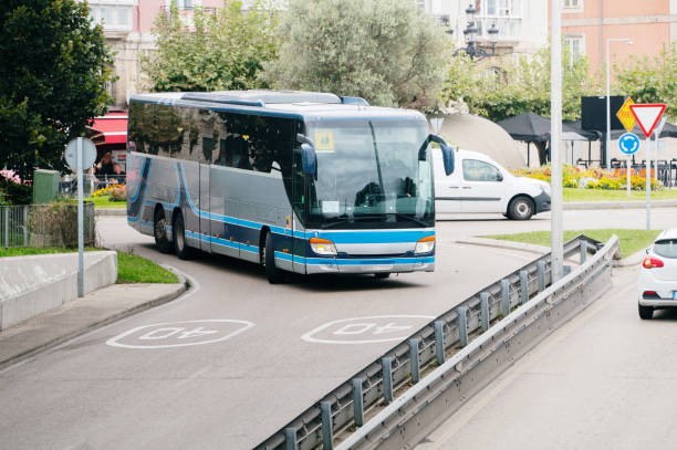 istock Coach bus in a city 2171462908