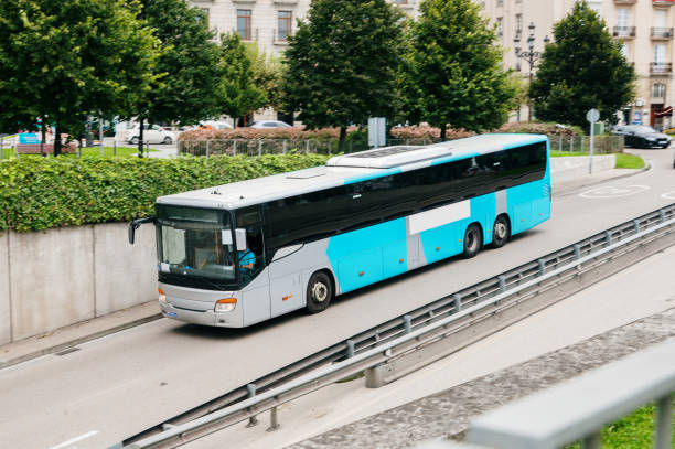 istock Coach bus in a city 2171463436