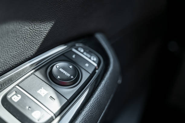 istock Close-up of side mirror adjustment button on the car door panel 2171468511