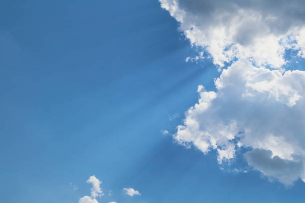 blue sky and cloud with sun light beams