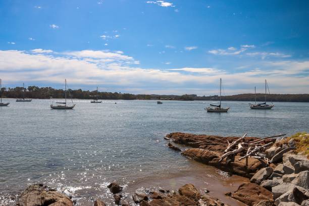 istock Serene coastal scene with anchored sailboats 2171470594