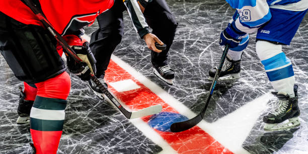 istock A close-up shows the captains' intense focus during the face-off 2171478654