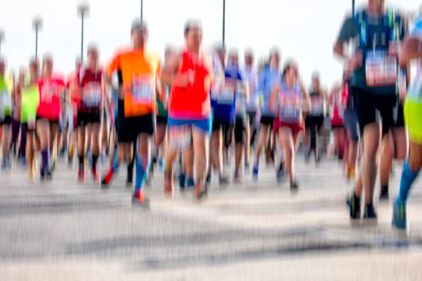 Large group of people are running at sunset, Blurry motion.Istanbul - Turkey.