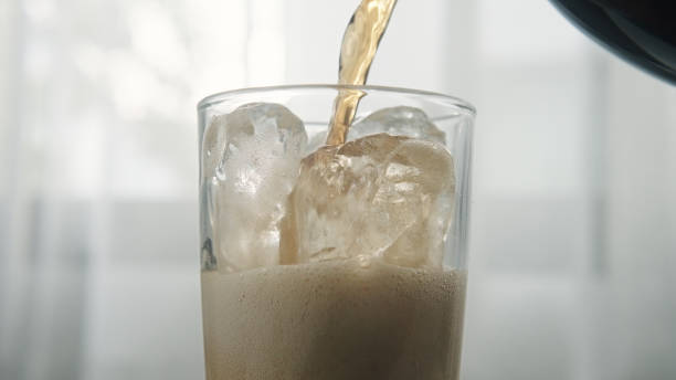 istock Pouring cola into a glass. 2171484448