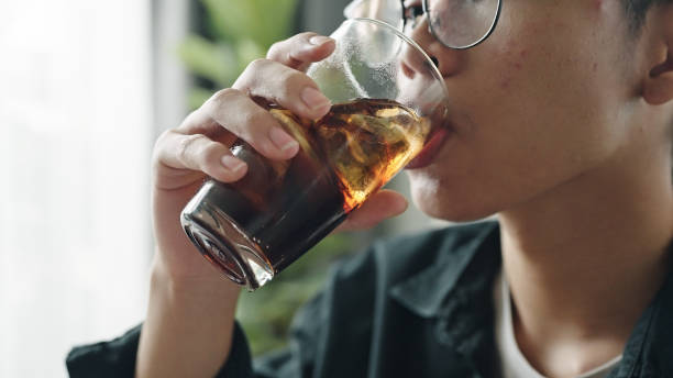 istock Teenage drinking cola. 2171484513