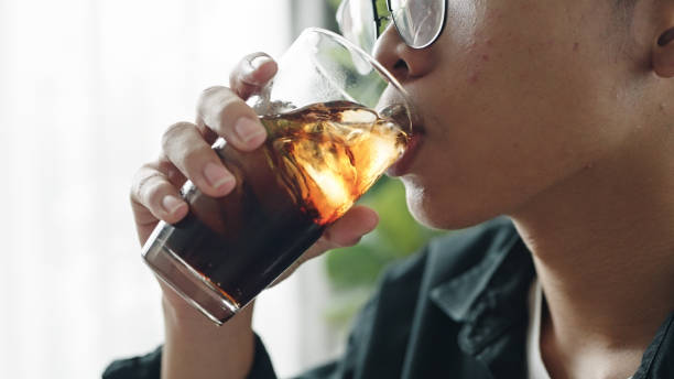 istock Teenage drinking cola. 2171484581