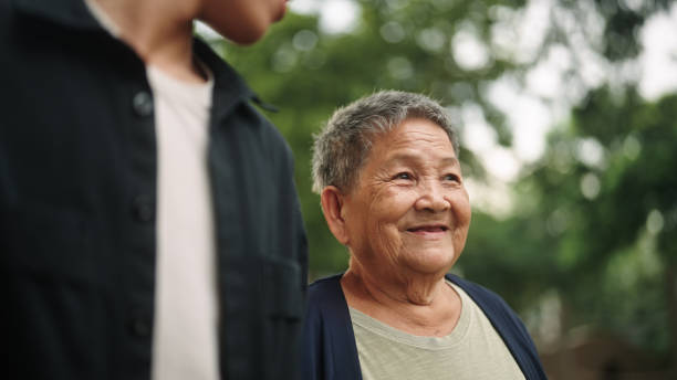 istock Elderly relaxing at park with her grandson. 2171484593