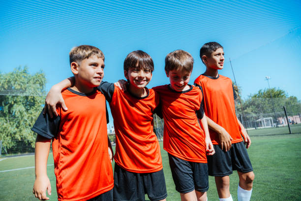istock Joyful Group of Kids on Soccer Field 2171492742