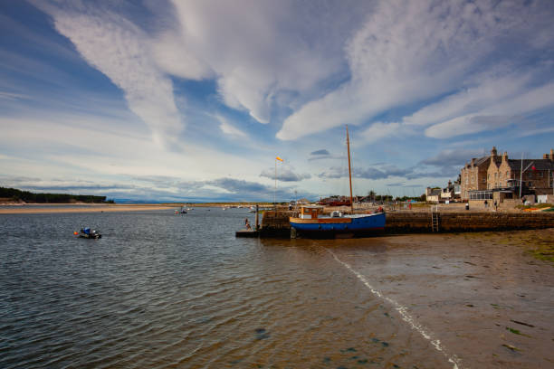 Findhorn , Scotland  - August 7,2022: Sunset in Findhorn port.Findhorn is a village in Moray, Scotland.