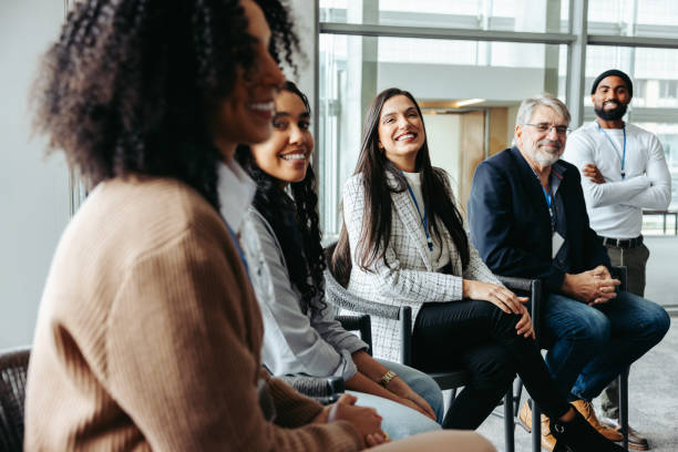 istock Multiethnic colleagues networking and laughing during a business meeting 2171499634
