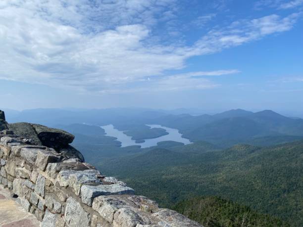 istock Scenic view from Whiteface Mountain summit with stone wall and winding river. 2171503660