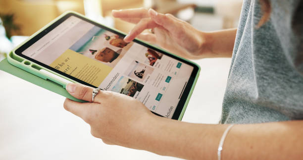 istock Hands, tablet and holiday with planning, screen or search for discount for accommodation. Person, ux and online shopping for deal, vacation or hospitality for tropical getaway 2171506949