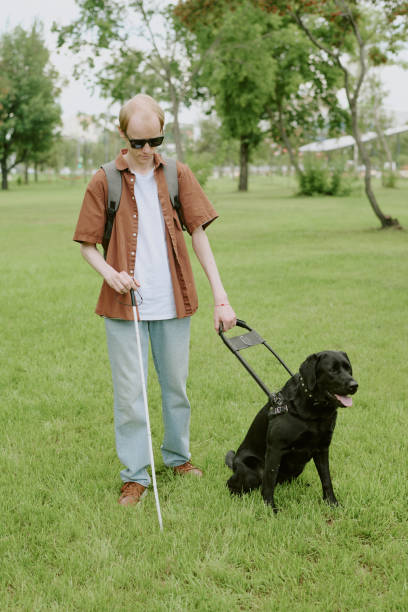 istock Man with Disability Walking in Park 2171513517