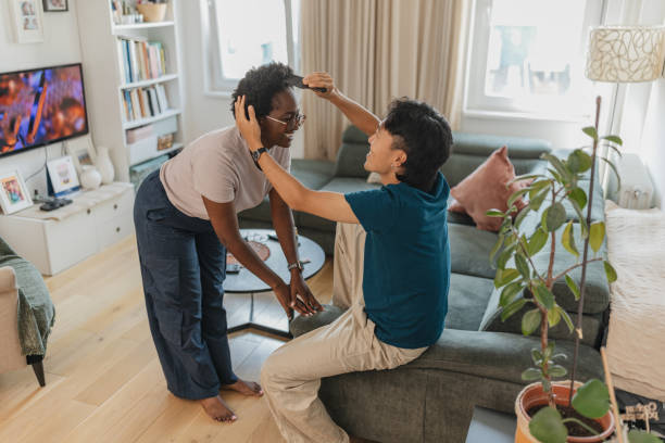 istock Two people share a comforting touch in a cozy living room 2171514663