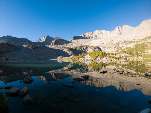 istock Mountain Reflections in a Serene Alpine Lake 2171514966