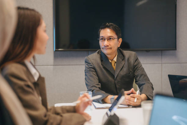 istock Group of multi-ethnic business people working together 2171519650