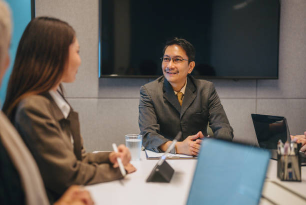 istock Group of multi-ethnic business people working together 2171519670