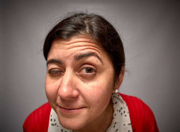 woman looking at the photo camera