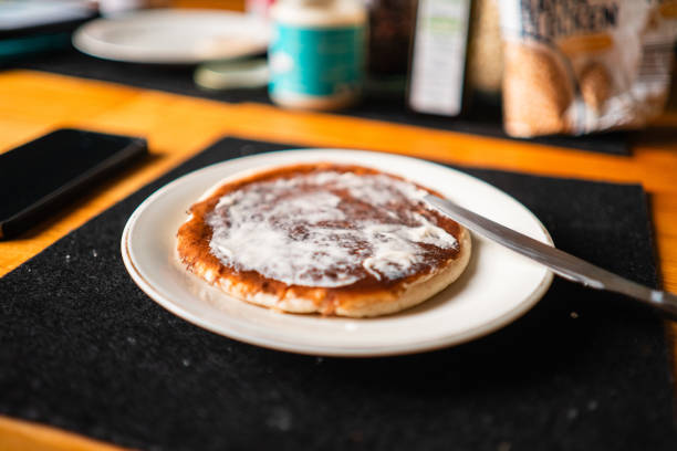 Man making pancakes in the kitchen