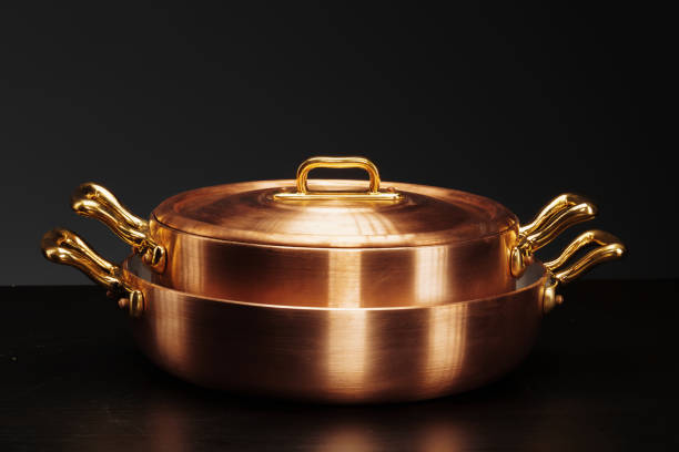 istock Set of copper cookware over dark background 2171524585