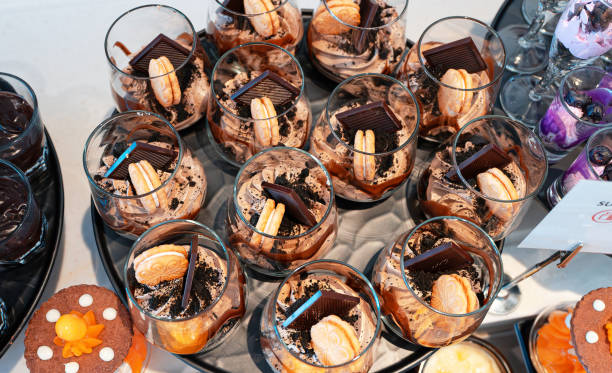 istock Chocolate whipped cream in a glass on a banquet table. 2171524798