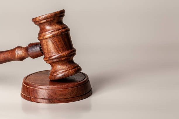 istock Wooden judges gavel on table close up 2171527032
