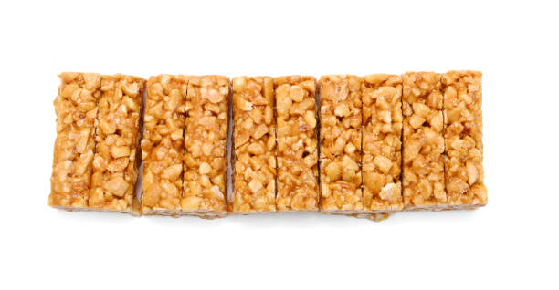 istock Honey bars with peanuts, sesame and sunflower seeds isolated 2171527037