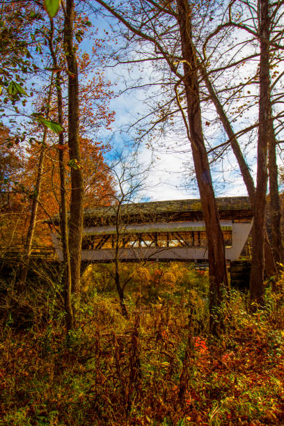 istock Mink Hollow Covered Bridge in Autumn, Lancaster, Ohio 2171527668