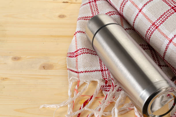 istock Aluminum metal thermos container bottle close up on table 2171531639