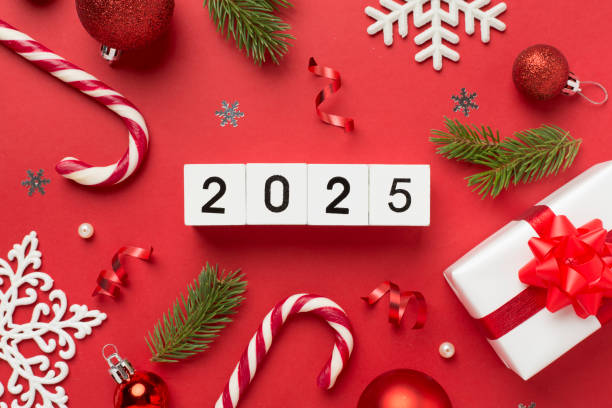 istock 2025 with confetti and decor on color background, top view 2171532367