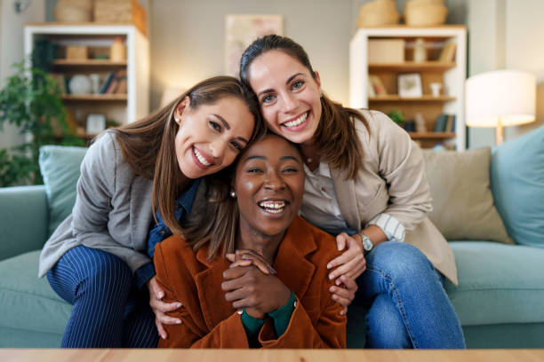 istock Cheerful Friends Enjoying Video Call in Home Setting 2171532729