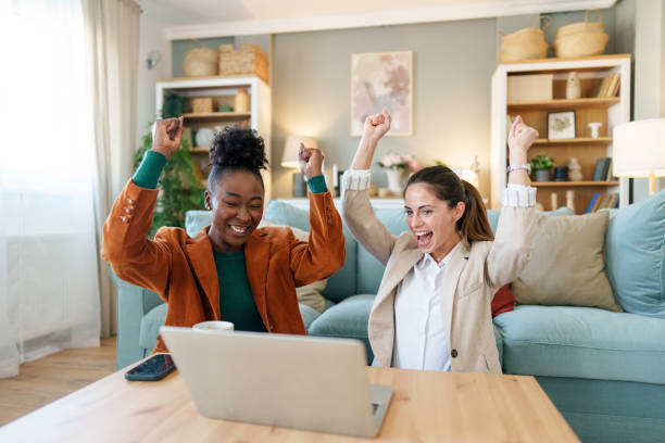 istock Diverse Entrepreneurs Celebrate Success at Home Office 2171532758