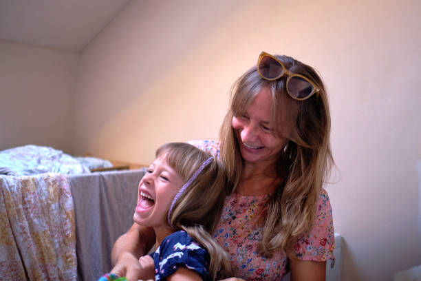 istock Mother and Daughter Sharing a Joyful Moment 2171534282